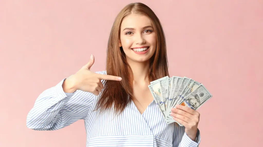 financial tips, woman holding 100 dollar bills